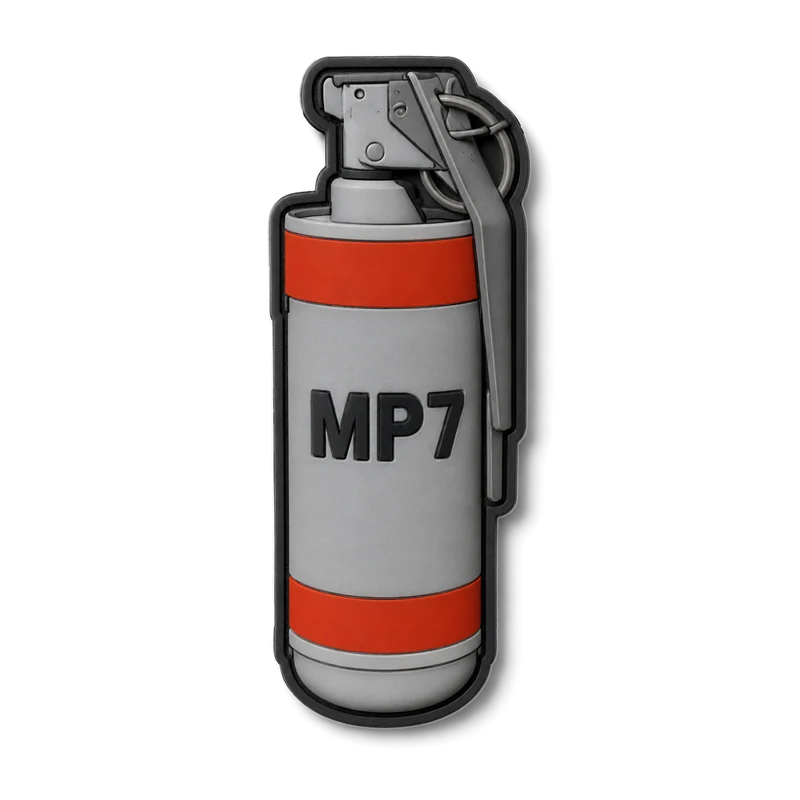 Écusson découpé à la forme d’une grenade grise cerclée de rouge, inscription MP7.